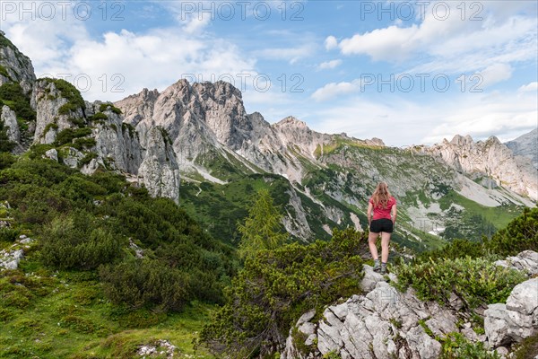 Young woman looking over landscape