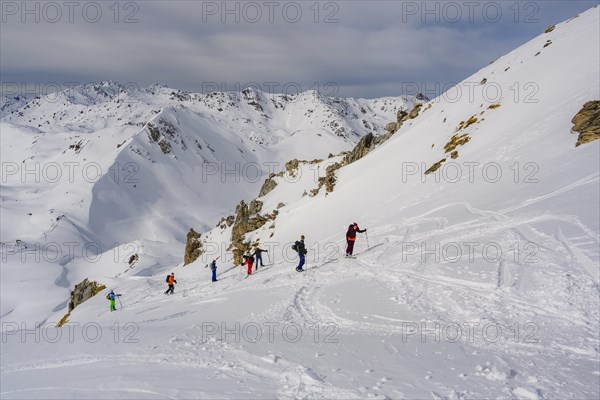 Ski tourers in the snow