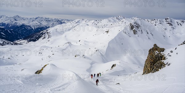 Ski tourers in the snow