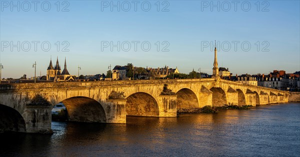 View on bridge Jacques Gabriel and the town of Blois at sunset