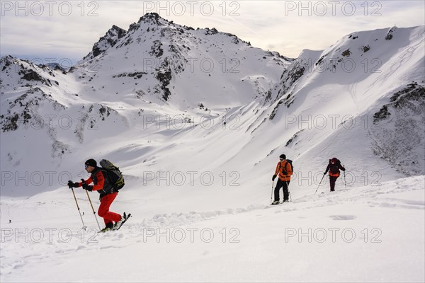 Ski tourers in the snow