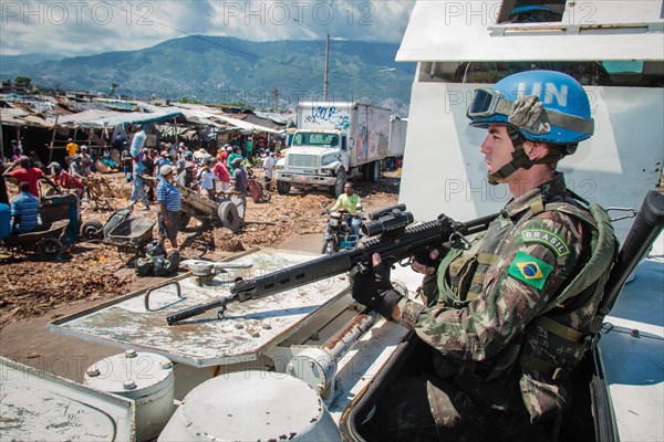 UN blue helmets in jeep on patrol