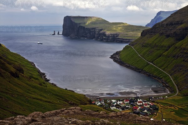 The small village of Tjornuvik with view of the Atlantic Ocean