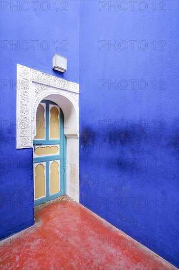 Colorful architecture in beautiful Majorelle Garden established by Yves Saint Laurent