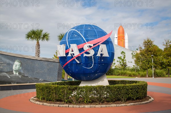 Nasa logo in front of Kennedy Space Center