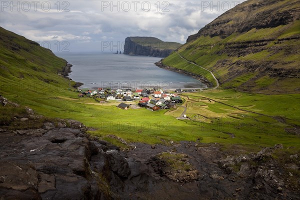 The small village of Tjornuvik with view of the Atlantic Ocean