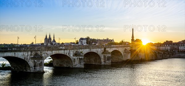 View on bridge Jacques Gabriel and the town of Blois at sunset