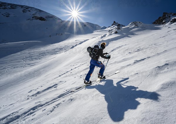 Ski tourers in steep terrain