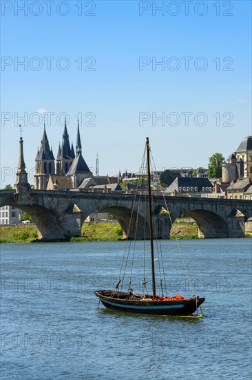 The Cessart bridge and Chateau de Saumur on river Loire