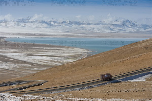Truck driving pass from north on the way to sacred Namtso Lake