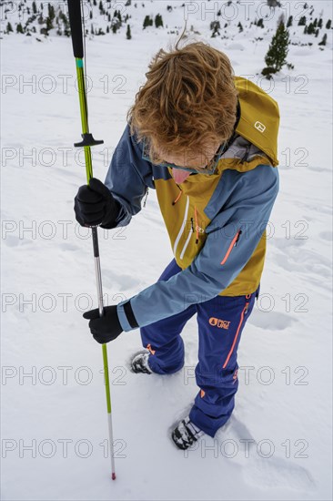 Ski tourer in the snow