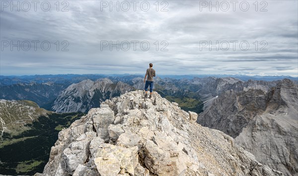 Hiker at the summit of the Birkkarspitze