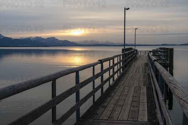 Footbridge at sunset at Chiemsee