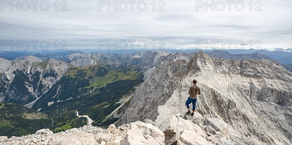 Hiker at the summit of the Birkkarspitze