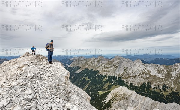 Hiker at the summit of the eastern Oedkarspitze