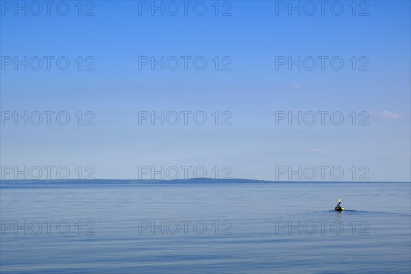 Canoeists in the sea Kattegat