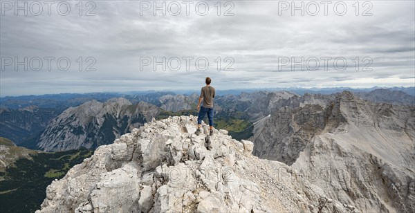 Hiker at the summit of the Birkkarspitze