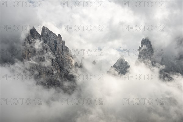 Cloud-covered rocky peaks