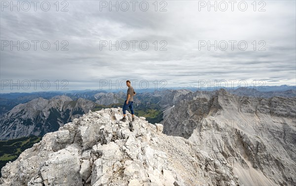 Hiker at the summit of the Birkkarspitze