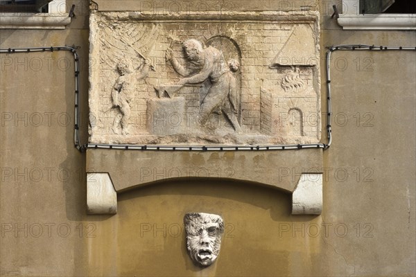 Relief on a house wall