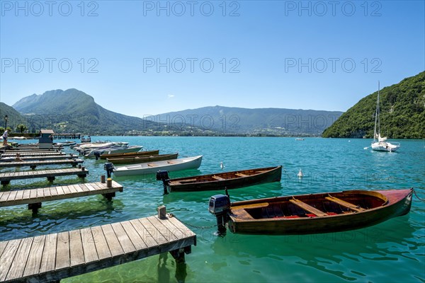 Annecy lake at Talloires village and Massif of Bauges