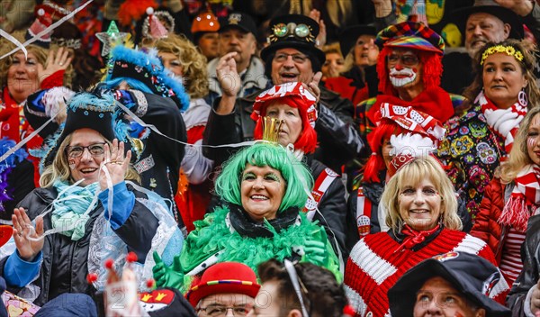 Colourfully costumed carnivalists celebrate carnival in Cologne