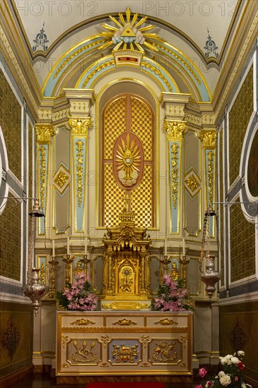 Side altar of a small church on San Miguel