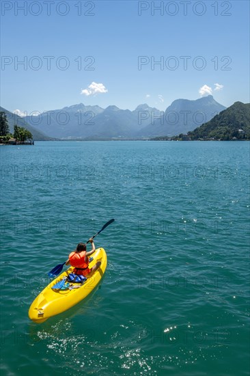 Annecy lake at Talloires village and Massif of Bauges