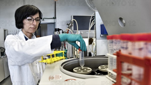 Laboratory assistant researching a vaccine against coronavirus