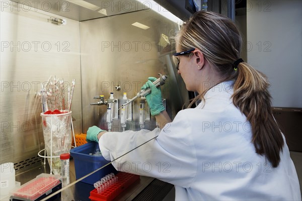 Laboratory assistant researching a vaccine against coronavirus