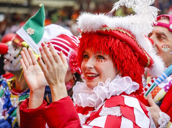 Colourfully costumed carnivalists celebrate carnival in Cologne