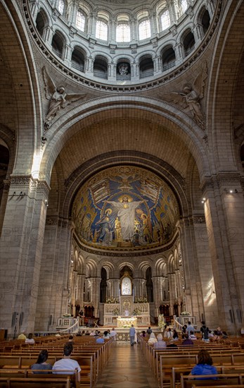 Interior view with main altar and mosaic in the apse