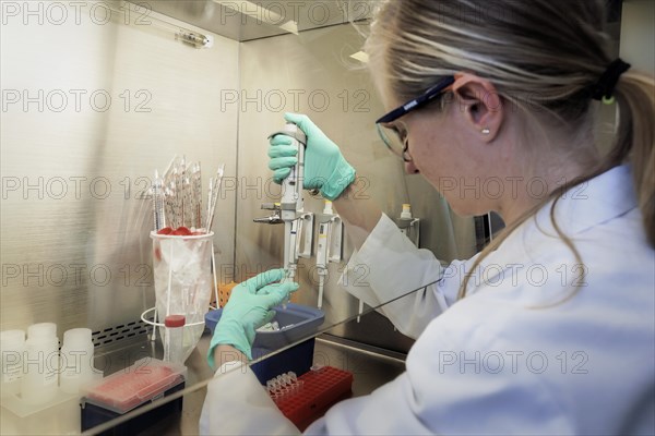 Laboratory assistant researching a vaccine against coronavirus