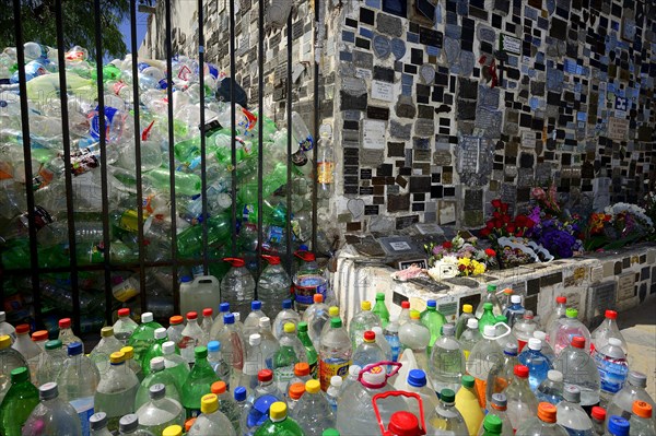 Water bottles as an offering at the shrine of Difunta Correa