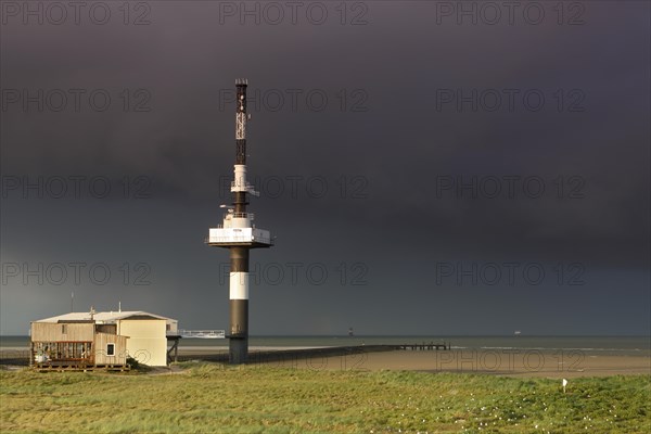 Radar tower on the Minsener Oog power plant in a bad weather front