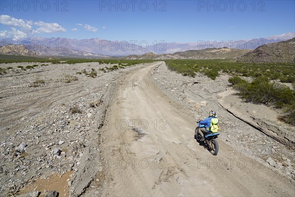 Motorcyclists on gravel road