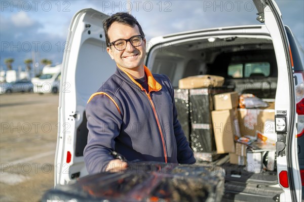 Delivery man handing out a parcel