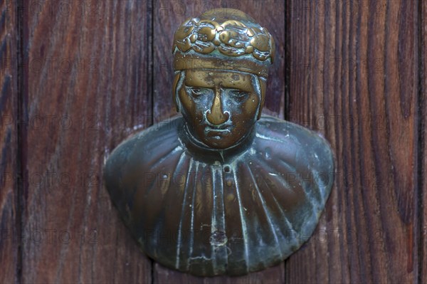 Male bronze figure as doorknob