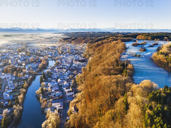 Wolfratshausen with Loisach and mountain forest in winter