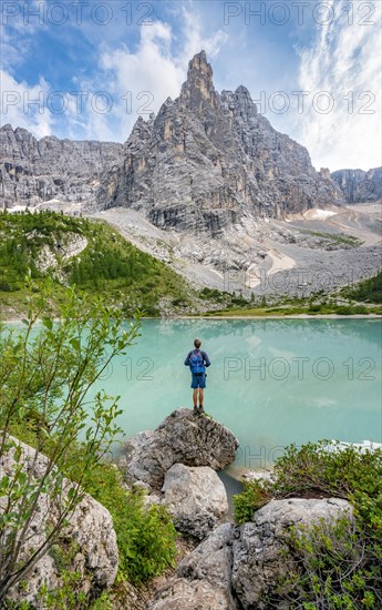 Young man standing on a stone