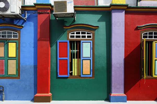 Colorful windows and facade of the old Chinese villa