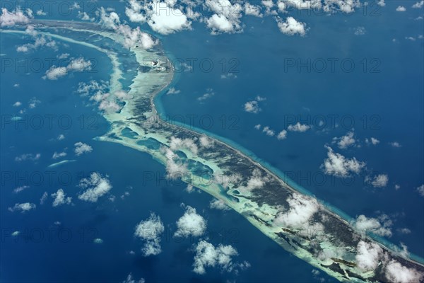 Outer reef with large dredged sand areas for land reclamation elsewhere