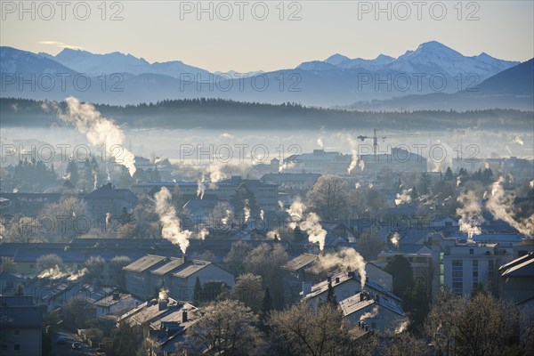 Wreaths of smoke from domestic heating systems in winter