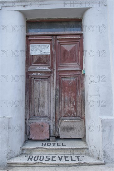 Entrance door of an old closed hotel