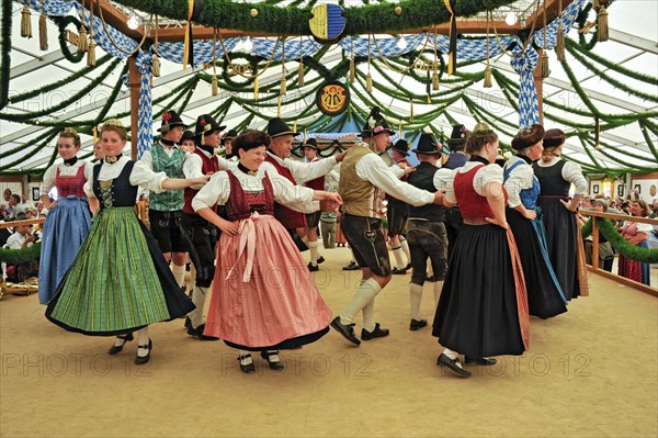 Dancers of a Bavarian folk dance group in traditional traditional traditional traditional traditional traditional traditional traditional traditional traditional costume