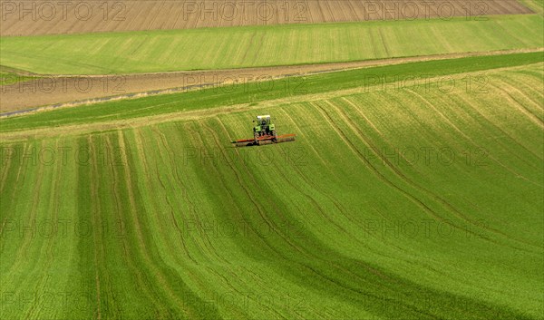 Farmer ploughing his field with tractor