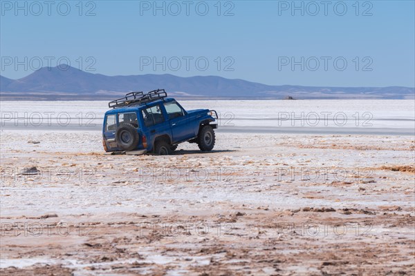 Off road vehicle stuck in a crumb of salt