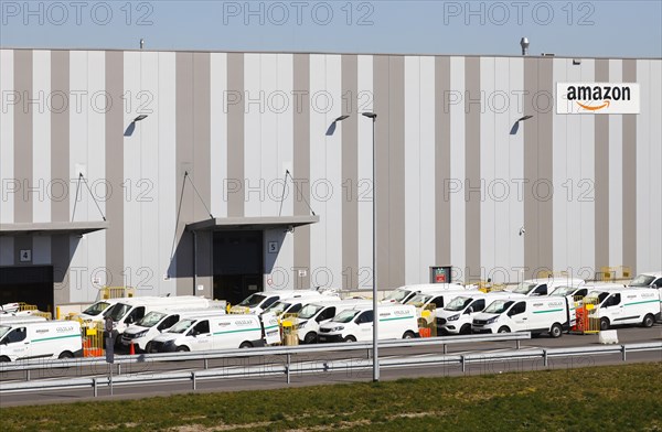 Amazon logistics centre with vans from parcel delivery company Onway Logistics