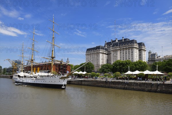 Argentinian Ministry of Defence or Libertador Building and frigate Sarmiento at Puerto Madero