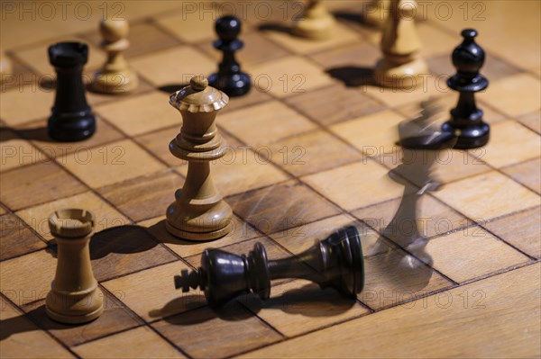 Chessboard with wooden chessmen